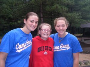 Camper Erin with former counselors Corey and Tracy. 